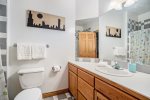 Lower level full bathroom with shower tub combo
